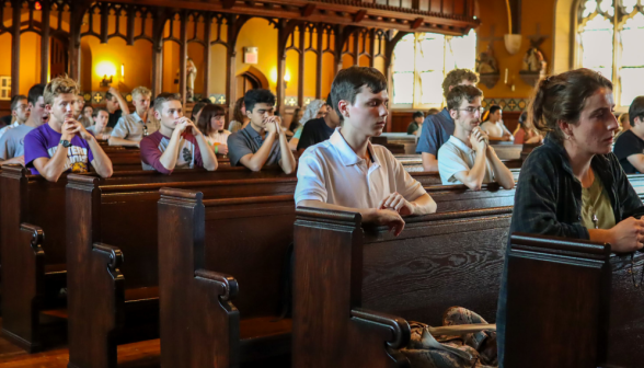 Students praying the Rosary in the Chapel