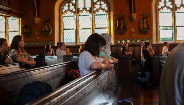 Students praying the Rosary in the Chapel