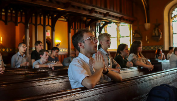 Students praying the Rosary in the Chapel