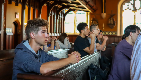 Students praying the Rosary in the Chapel