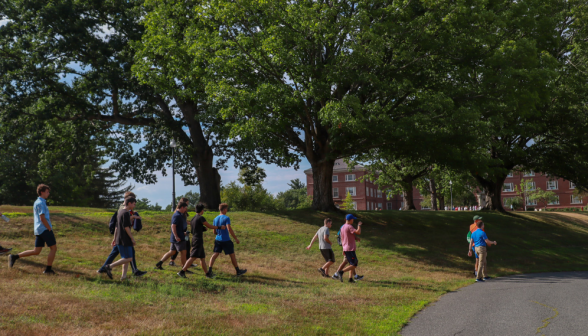 Student walk toward the gym