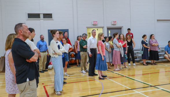 Students and families in the gym