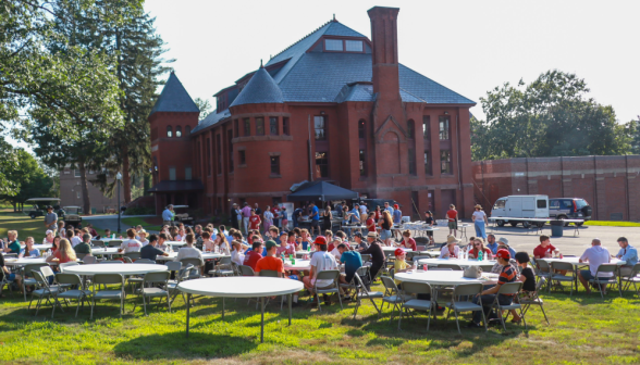 Students afront Tracy enjoy the BBQ with their families