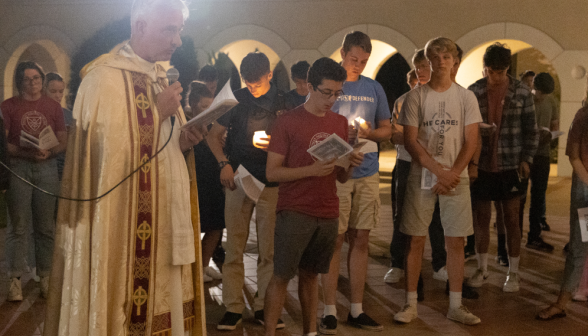 Students pray the Stations of the Cross