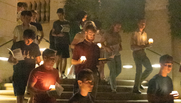 Students pray the Stations of the Cross