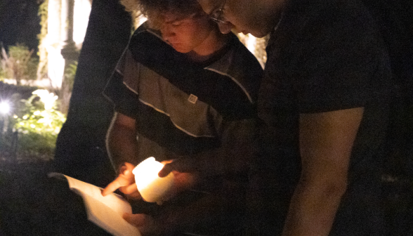 Students pray the Stations of the Cross