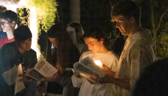 Students pray the Stations of the Cross