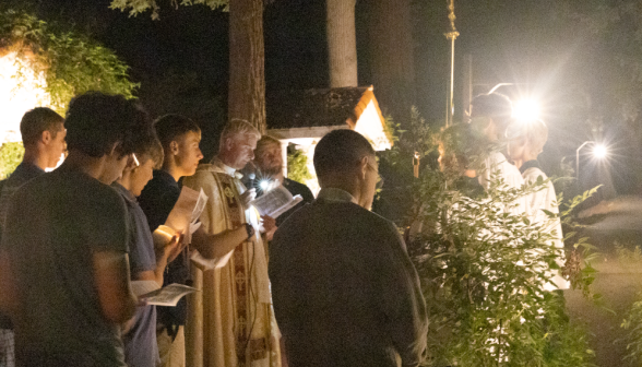 Students pray the Stations of the Cross