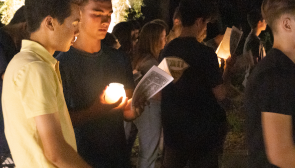 Students pray the Stations of the Cross