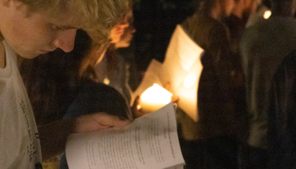 Students pray the Stations of the Cross