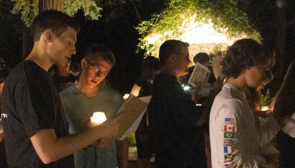 Students pray the Stations of the Cross