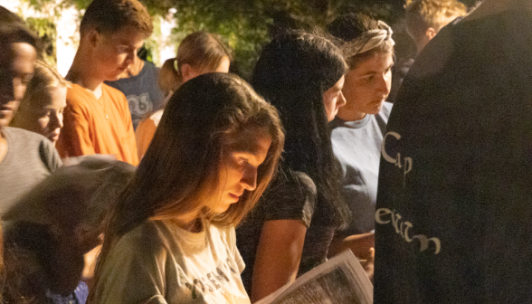 Students pray the Stations of the Cross