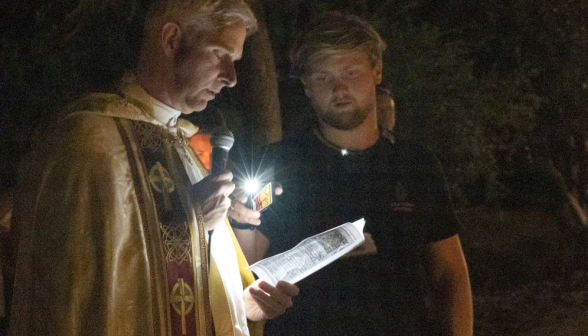 Students pray the Stations of the Cross