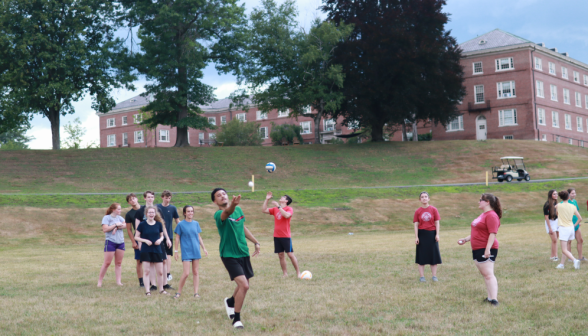 A student about to catch the flying egg in one hand!