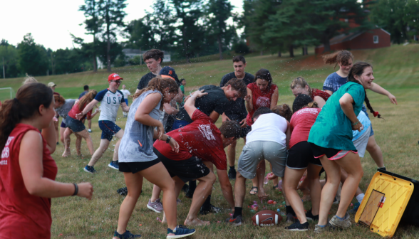 Close-quarters water-balloon warfare at the bin. Water is flying everywhere!