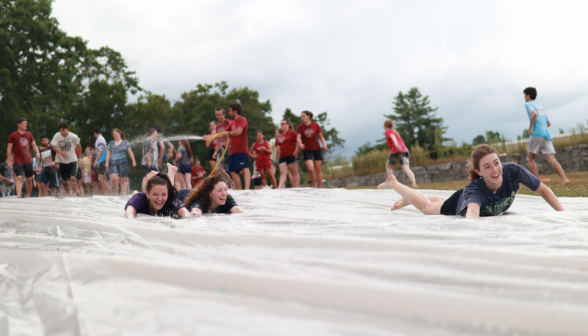 Three go down the slide