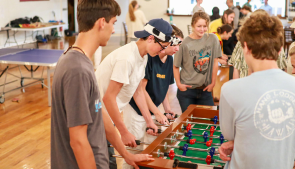 Students play foosball