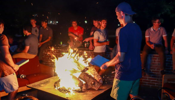 Students around the campfire