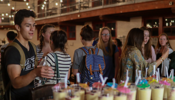 Students around the drink counter