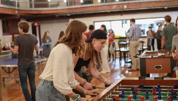 Two play foosball