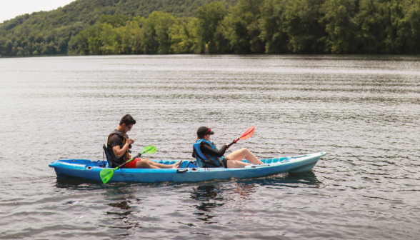 Two in a kayak, all alone on the open water