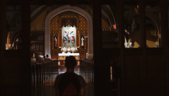 Students pray before Our Lord on the altar