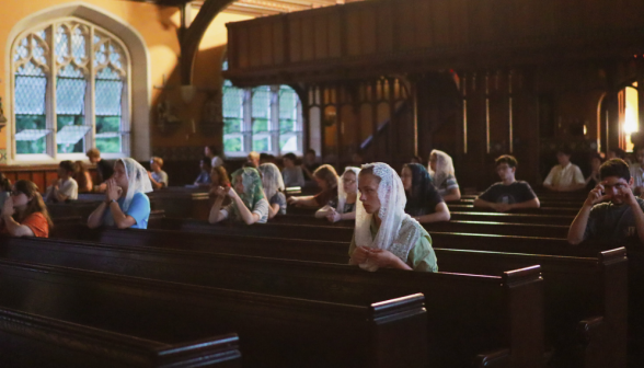 Students pray before Our Lord on the altar