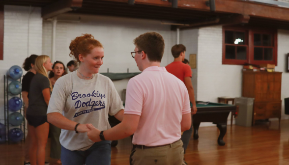 Two students dancing