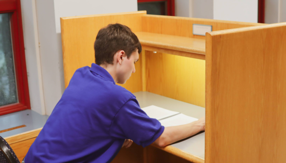 A student at an individual desk