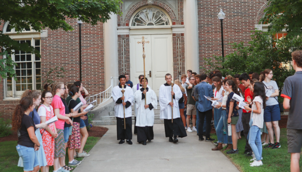 Students pray the Stations of the Cross