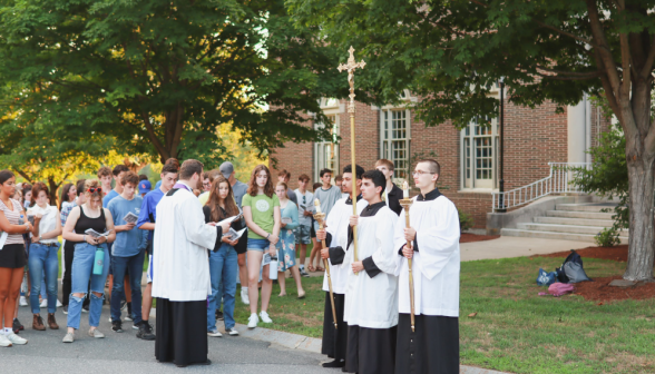 Students pray the Stations of the Cross