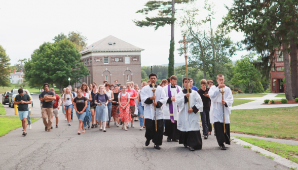 Students pray the Stations of the Cross