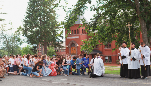 Students pray the Stations of the Cross