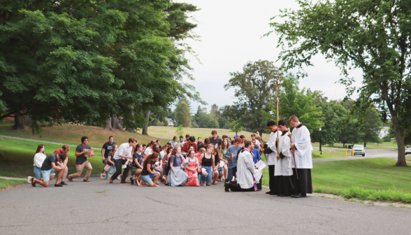 Students pray the Stations of the Cross