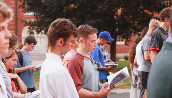 Students pray the Stations of the Cross