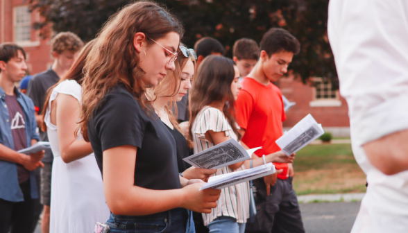 Students pray the Stations of the Cross