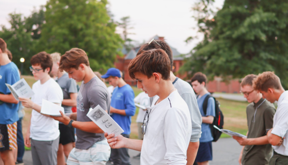 Students pray the Stations of the Cross