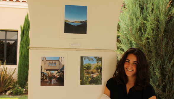 A student presents highlights of their photography collection
