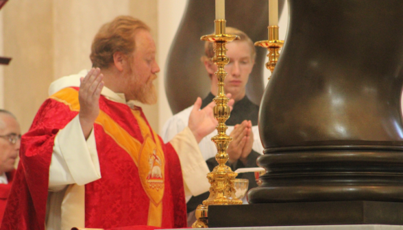 Fr. Michaels at the altar