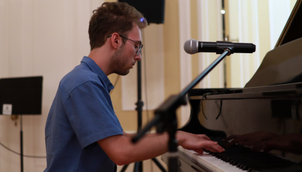 A student plays the piano