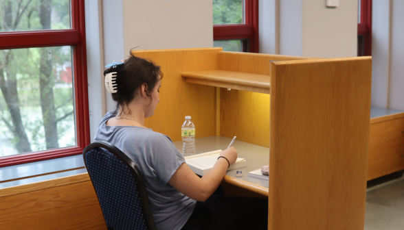 A student at an individual desk