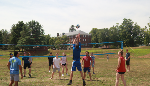 A student hits the ball