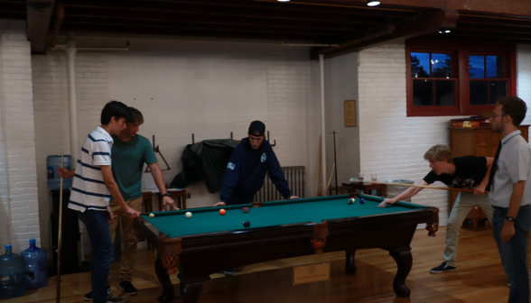 Students play pool