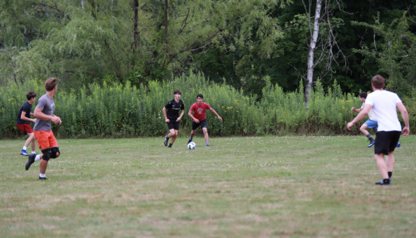 Students playing soccer