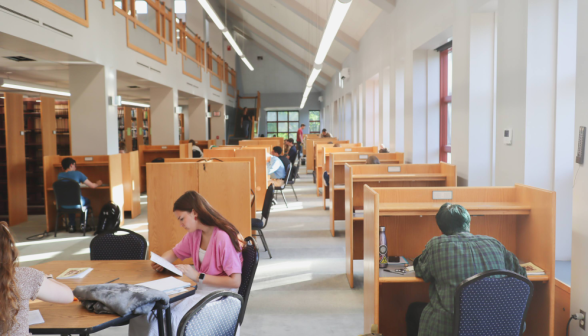 Long shot of students at individual desks