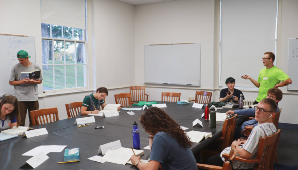 Students study at the classroom table