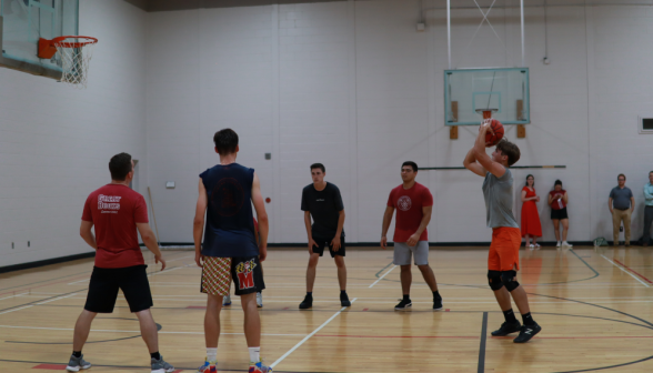 A student takes a free throw