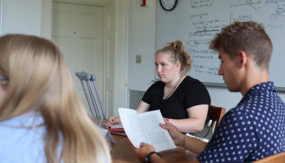 Students examine the text