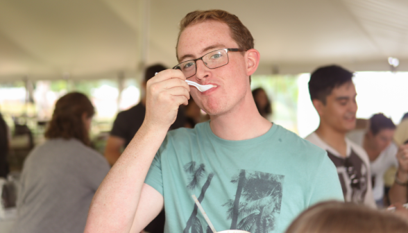 A student polishes off a scoop of ice cream