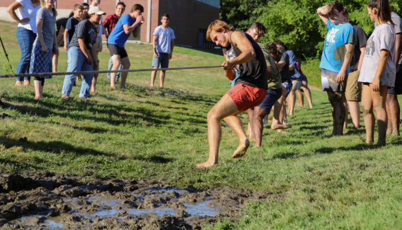 The sophomore team is dragged toward the mud